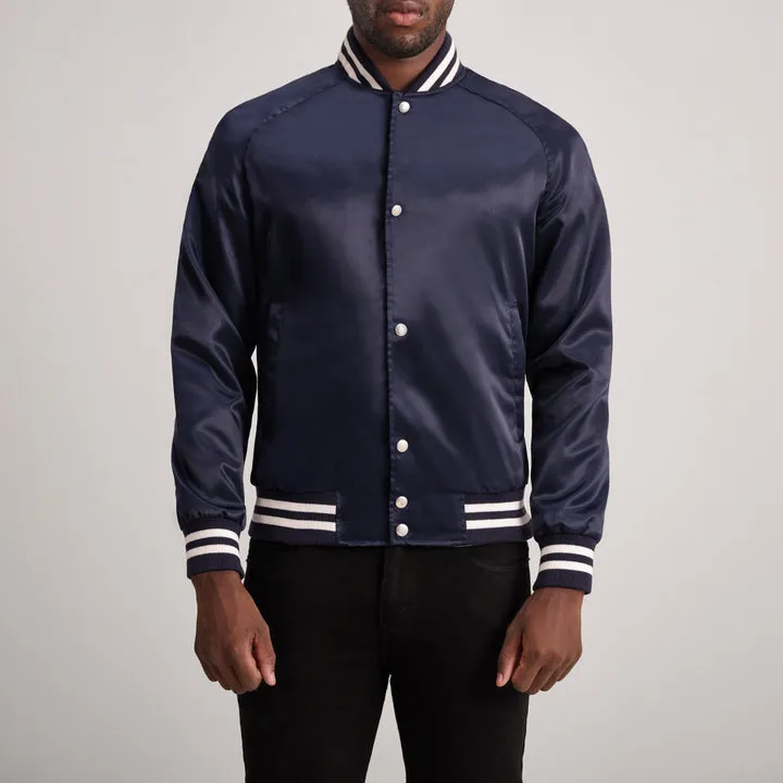 Xander Blue Varsity Jacket – front view showing blue wool body, contrasting leather sleeves and ribbed collar