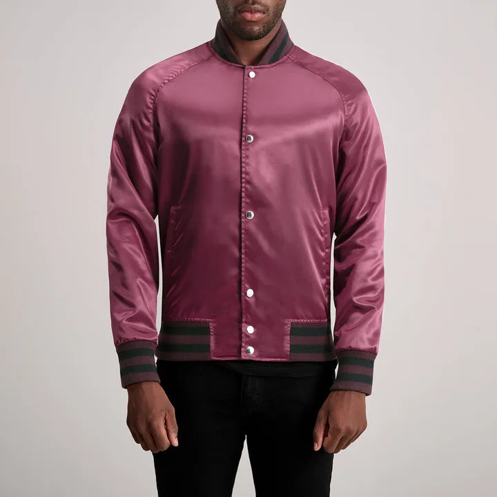 “Xander Maroon Varsity Jacket with maroon wool body, leather sleeves, ribbed trims, and classic varsity styling.”