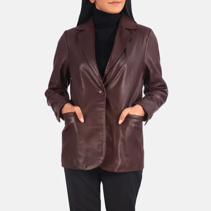 “Norma Maroon Leather Blazer with premium maroon leather, structured fit, notch lapels, button-front closure, and functional pockets for elegant style.”
