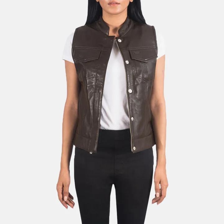 “Rayne Moto Brown Leather Vest with premium brown leather, zip-front closure, snap collar, adjustable side tabs, and multiple functional pockets.”