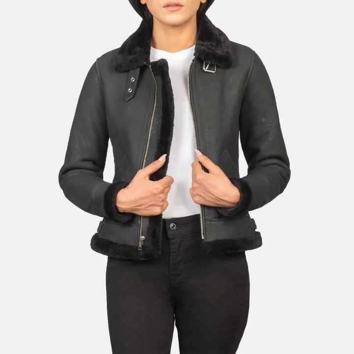“Sherilyn B-3 Distressed Black Leather Bomber Jacket with distressed leather and shearling lining”