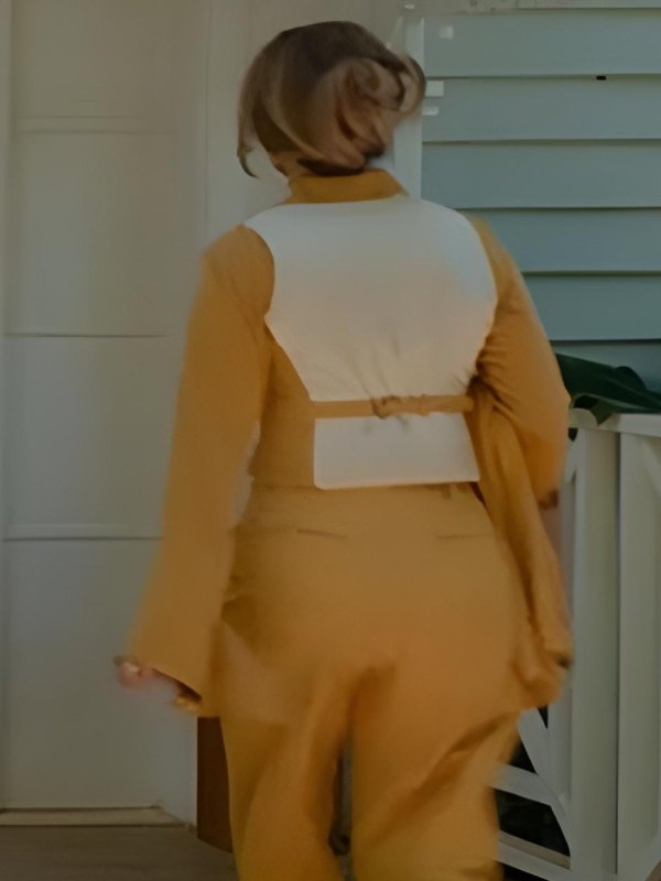 Office Romance 2026 Jennifer Lopez Mustard Vest
