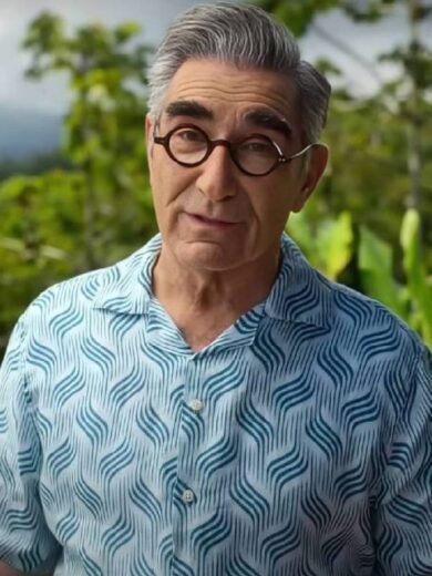 The Reluctant Traveler S3 Eugene Levy Blue Shirt
